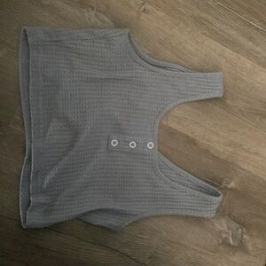 This is a medium tank top. I’m not sure what brand it is. It is like brand new